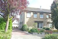 Woning Burg. Hillenaarstraat 1 Appeltern