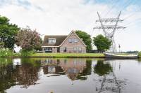 Woning Broekermeerdijk 34 Watergang