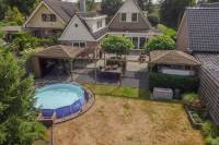 Woning Ds. Visscherwei 8 Houtigehage