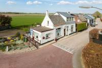 Woning Brugdam 1 LAGE ZWALUWE