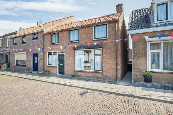Woning Stationsweg 6 HEINKENSZAND