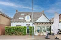 Woning Lindenlaan 52 + 52a Huizen