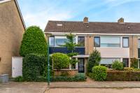 Woning Dr. Tilanuslaan 12 Woerden