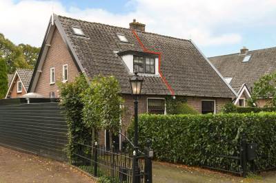 Woning Koningin Wilhelminastraat 1a Huizen