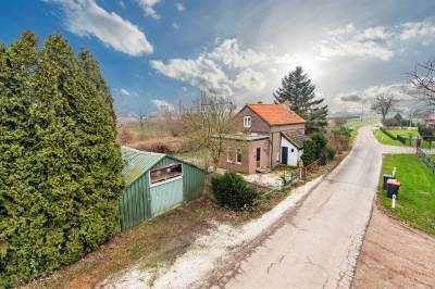 Woning Stationsweg 1 Wadenoijen