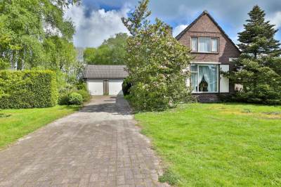 Woning Ds. Visscherwei 18 Houtigehage