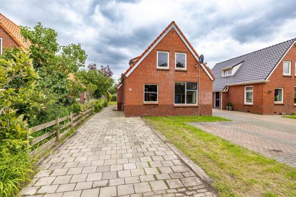 Woning Koopmanslaan 4 Tjuchem