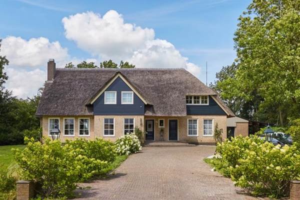 Woning Noorddijkerweg 23 Ursem (Gem. Koggenland)