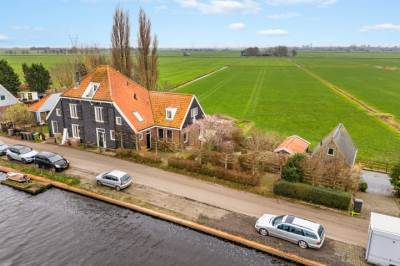 Woning Broekermeerdijk 14 Watergang