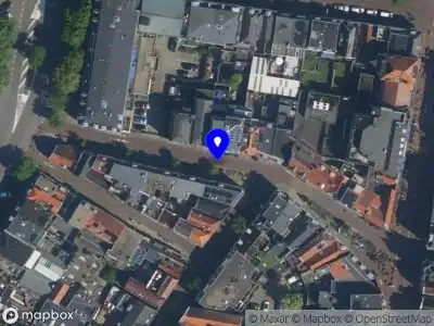 Nieuw bedrijf VvE flatgebouw Nassaustraat 25 zwart en rood