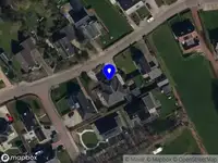 Vereniging van Eigenaars van het Flatgebouw te Haarlem, Westergracht 99 zwart en rood