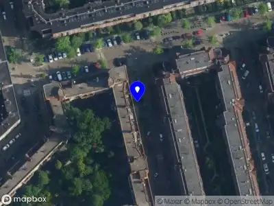 Ambulance met gepaste spoed naar de Talmastraat in Amsterdam