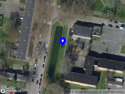 Ambulance met grote spoed naar de Kerkwervesingel in Rotterdam