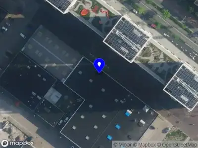 Ambulance met grote spoed naar de NDSM-straat in Amsterdam