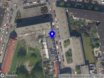 Ambulance met gepaste spoed naar de Beverstraat in Rotterdam