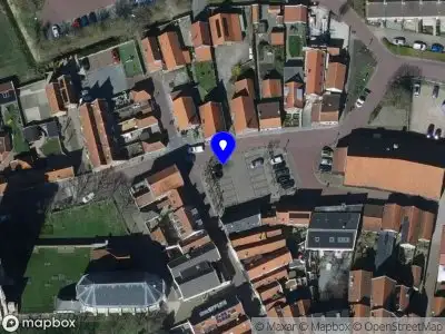 Ambulance met grote spoed naar de Varkensmarkt in Goedereede