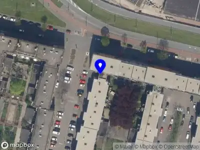 Ambulance met grote spoed naar de Dempostraat in Rotterdam