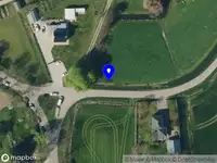 Politie naar de Noordereind in Kerk-Avezaath vanwege personen te water