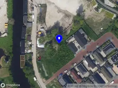 Ambulance met gepaste spoed naar de Muzikantenstraat in Leiden