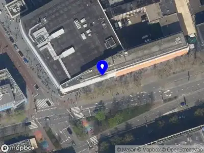 Ambulance met gepaste spoed naar de Westblaak in Rotterdam