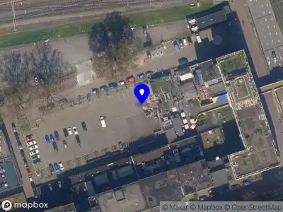 Ambulance met gepaste spoed naar de Schiestraat in Rotterdam