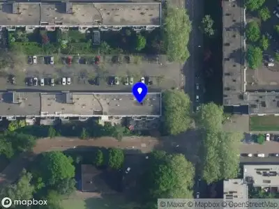 Ambulance met gepaste spoed naar de Hof van Groenen in Amsterdam