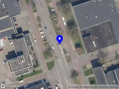 Ambulance met grote spoed naar de 's-Gravelandseweg in Schiedam