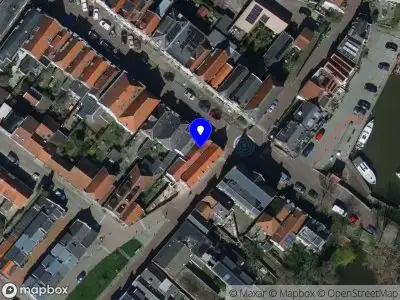 Ambulance met grote spoed naar de Voorstraat in Ooltgensplaat