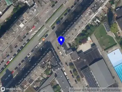Ambulance met gepaste spoed naar de Van Maanenstraat in Rotterdam