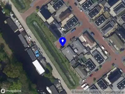 Ambulance met gepaste spoed naar de Koopmanstraat in Leiden