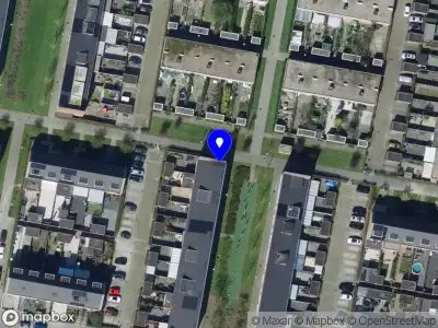 Ambulance met grote spoed naar de Rilland Bathstraat in Rotterdam
