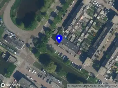 Ambulance met grote spoed naar de Anielewiczsingel in Amsterdam