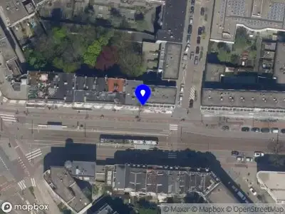 Ambulance met grote spoed naar de Vierambachtsstraat in Rotterdam