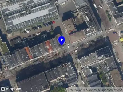 Ambulance met grote spoed naar de Witte de Withstraat in Rotterdam