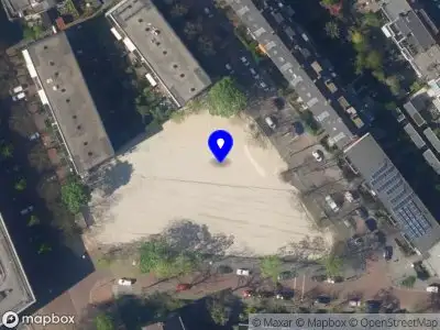 Ambulance met grote spoed naar de Mariastraat in 's-Gravenhage