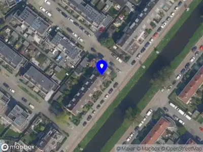 Ambulance met grote spoed naar de Kastanjesingel in Rotterdam