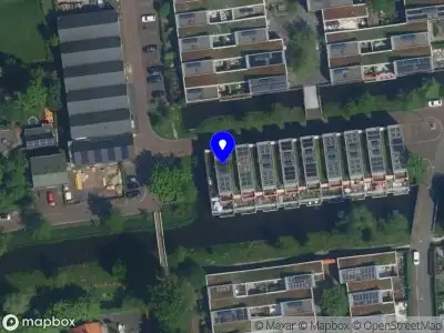 Ambulance met grote spoed naar de Vierpoldersstraat in Haarlem