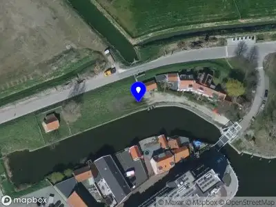 Ambulance met gepaste spoed naar de Sommelsdijkse Havendijk in Middelharnis