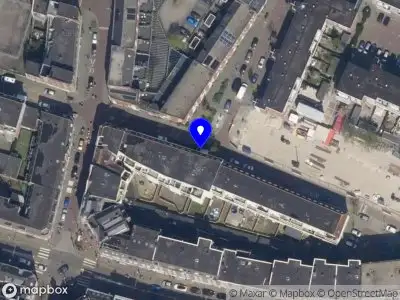 Ambulance met grote spoed naar de Wolstraat in Rotterdam