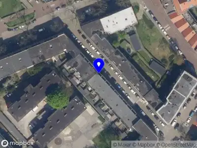 Ambulance met grote spoed naar de Couwaelstraat in Rotterdam