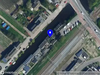 Ambulance met grote spoed naar de Haarlemmertrekvaart in Voorhout