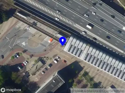 Ambulance met grote spoed naar de Stationsplein in Voorburg