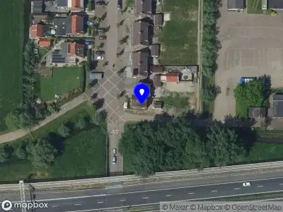 Ambulance met grote spoed naar de Sluisweg in Hardinxveld-Giessendam