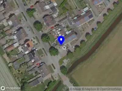 Politie naar de Everlosebeekstraat in Koningslust vanwege voertuigen te water