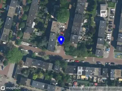 Ambulance met gepaste spoed naar de Schweigmannstraat in Amsterdam