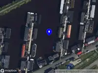 Brandweer met grote spoed naar de Woonschepenhaven in Groningen