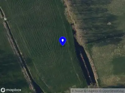 Politie met grote spoed naar de Vennerstraat in Paterswolde vanwege voertuigen te water