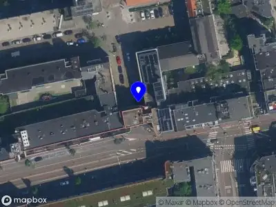Ambulance met gepaste spoed naar de Krommertstraat in Amsterdam