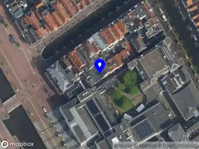 Ambulance met gepaste spoed naar de Smitsteeg in Delft