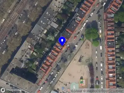 Ambulance met gepaste spoed naar de Moerkerkestraat in Rotterdam